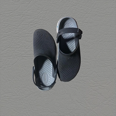 Pair of comfortable Crocs with ventilation holes and adjustable heel strap